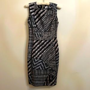 Super flattering Calvin Klein dress in a fun pattern.